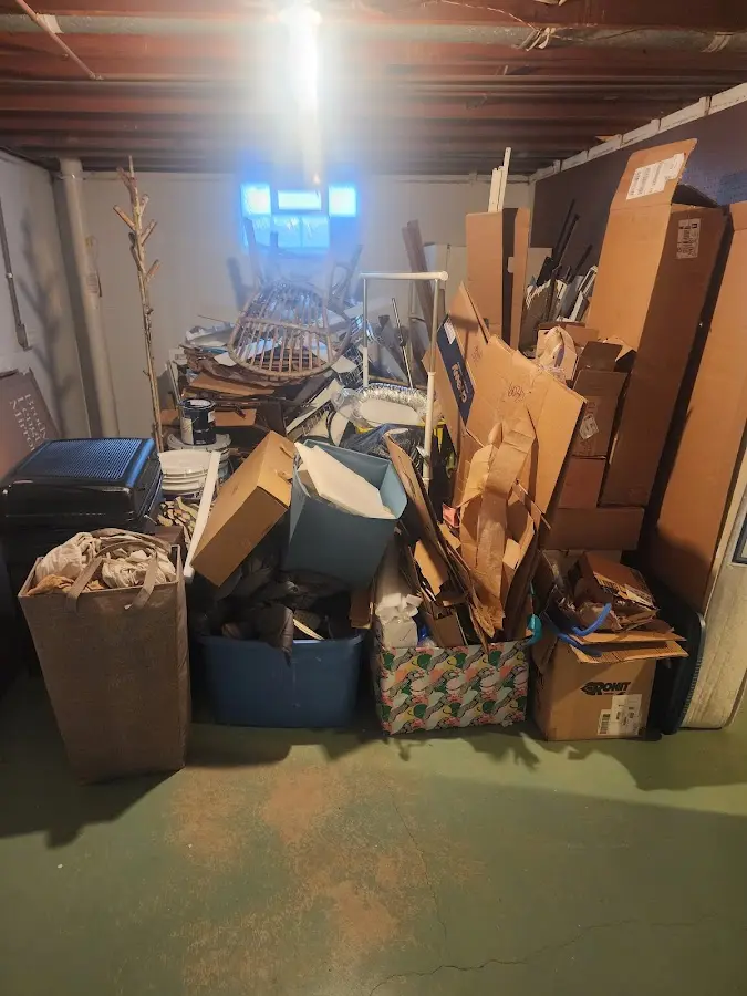 Roll-off dumpster container at job site for Cleanout Dumpster Rental in Sullivan